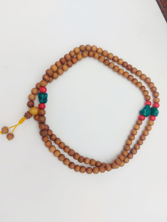 Mala legno bagnato in olio di sandalo