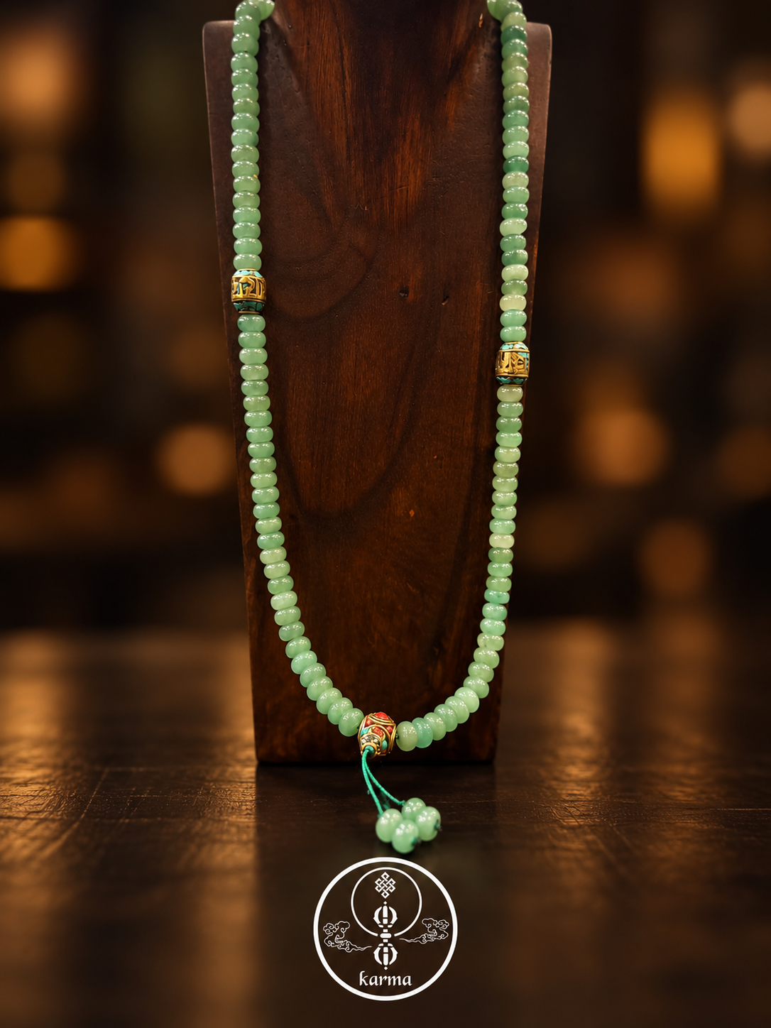 Mala in Giada Verde con Dzi a Quattro Occhi e Mantra Sacro